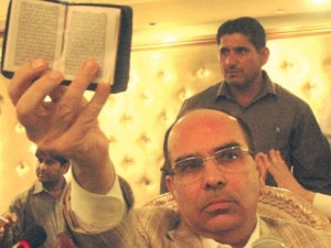 MR holding the Holy Quran while he levelled horrendous allegations against CJ and Arsalan